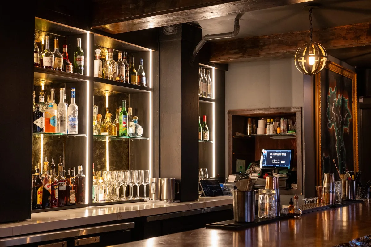 The back bar and spirits selection at Tulia Osteria