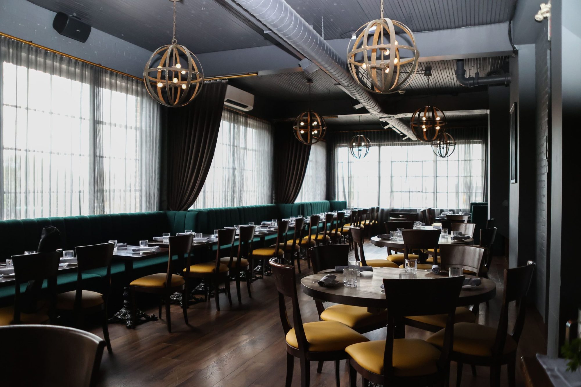 The full dining room at Tulia Osteria set for a private buyout